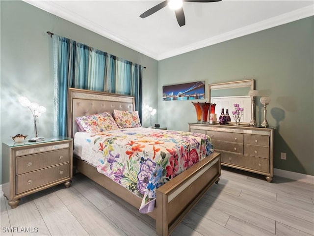 bedroom with ceiling fan, light hardwood / wood-style floors, and crown molding