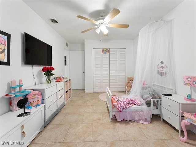 bedroom featuring ceiling fan and light tile patterned flooring