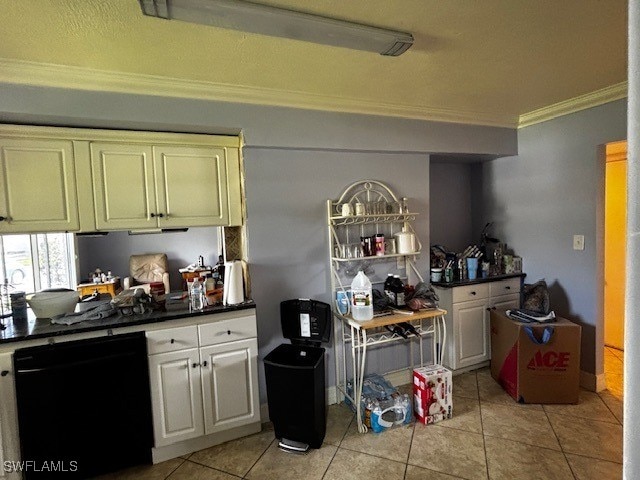 kitchen featuring dishwasher, white cabinetry, ornamental molding, and light tile patterned floors