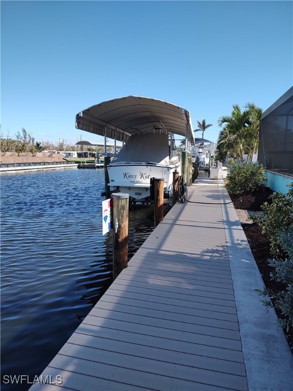 view of dock with a water view