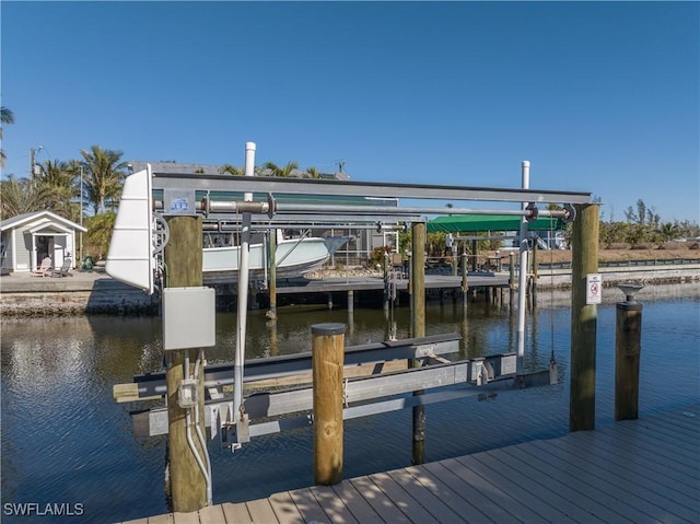 dock area featuring a water view