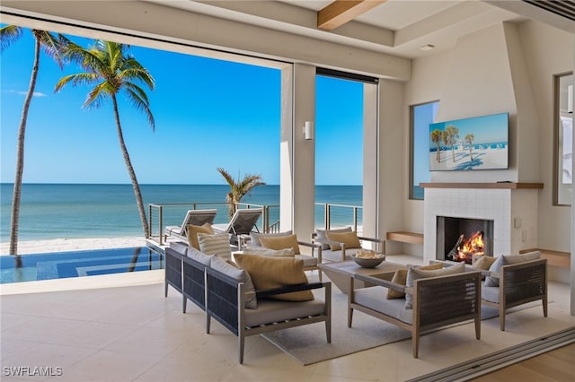 interior space with a tiled fireplace