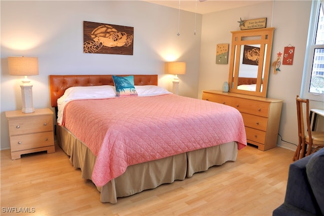 bedroom featuring light wood-type flooring