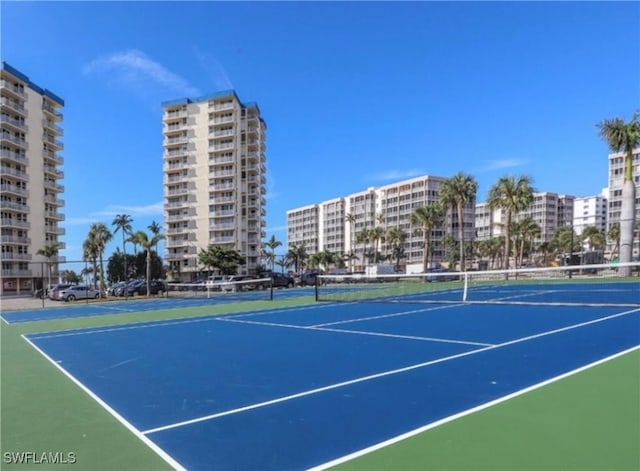 view of sport court with basketball hoop