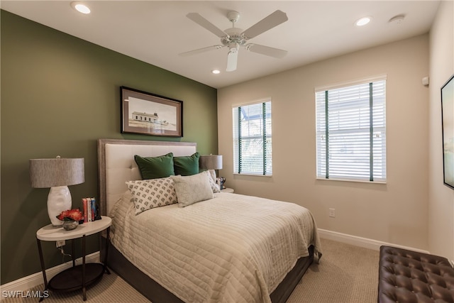 bedroom with ceiling fan and carpet flooring