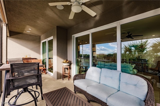 view of patio / terrace featuring ceiling fan and an outdoor hangout area