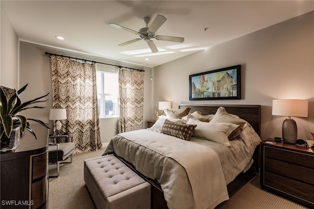 bedroom with light colored carpet and ceiling fan