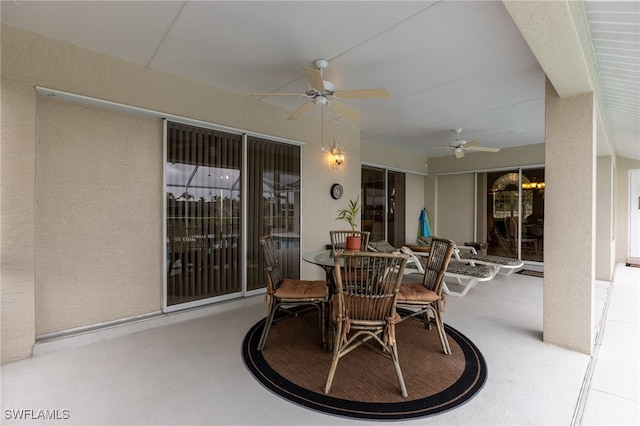 view of patio featuring ceiling fan