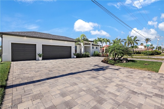 view of front of property featuring a garage