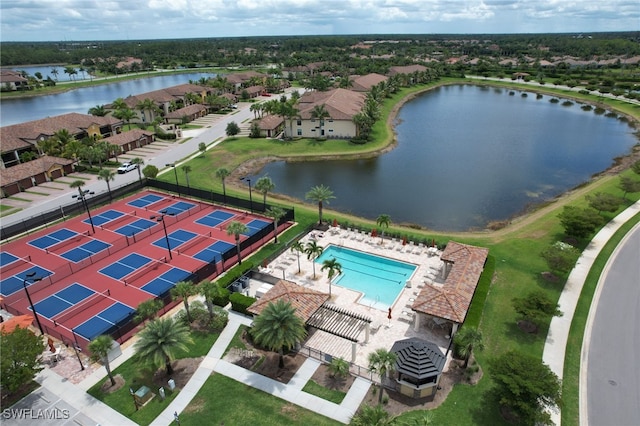 birds eye view of property featuring a water view