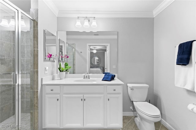 bathroom featuring toilet, a shower with door, tile patterned flooring, vanity, and crown molding