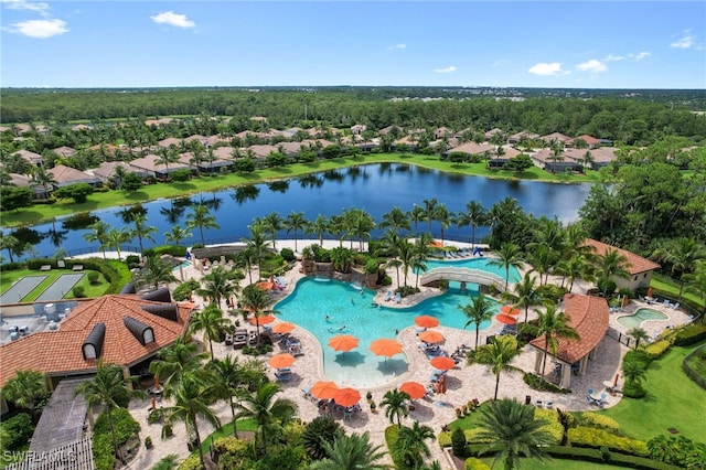 bird's eye view with a water view