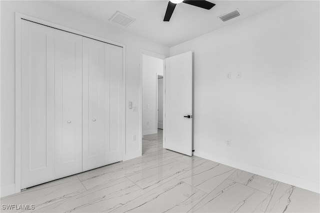 unfurnished bedroom with a closet and ceiling fan