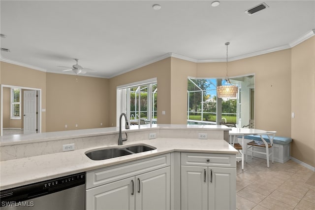 kitchen featuring ceiling fan, dishwasher, a sink, white cabinetry, and pendant lighting