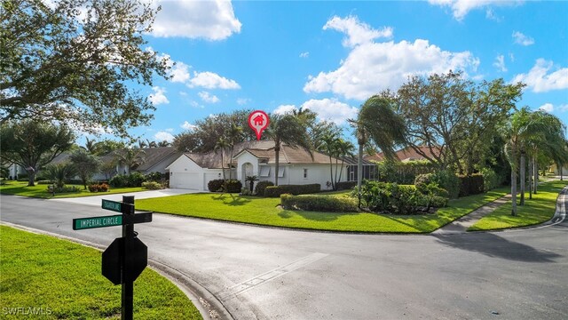 view of front of home with a front lawn