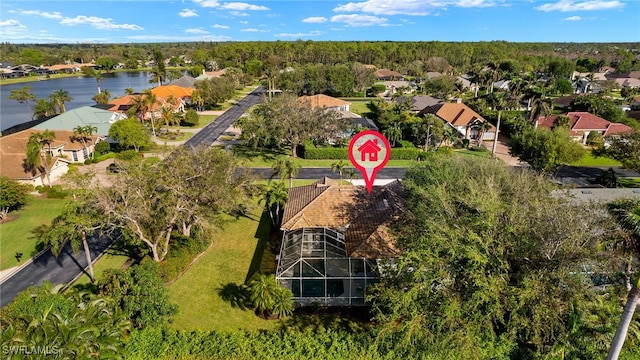 aerial view with a water view and a residential view
