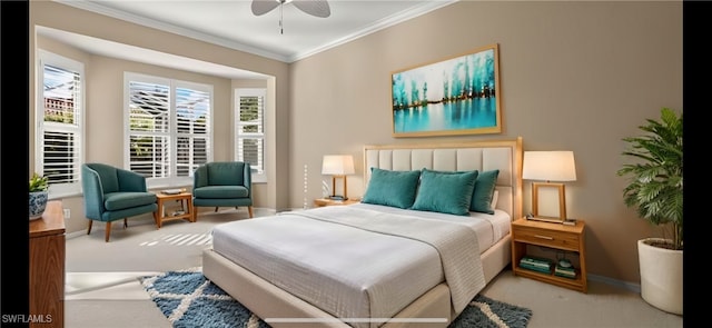 bedroom with ornamental molding, a ceiling fan, carpet, and baseboards