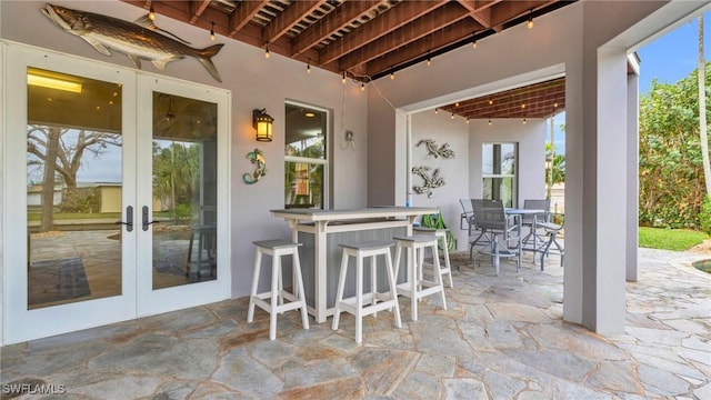 view of patio / terrace featuring french doors and outdoor dining space