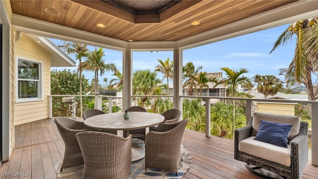 sunroom with wood ceiling