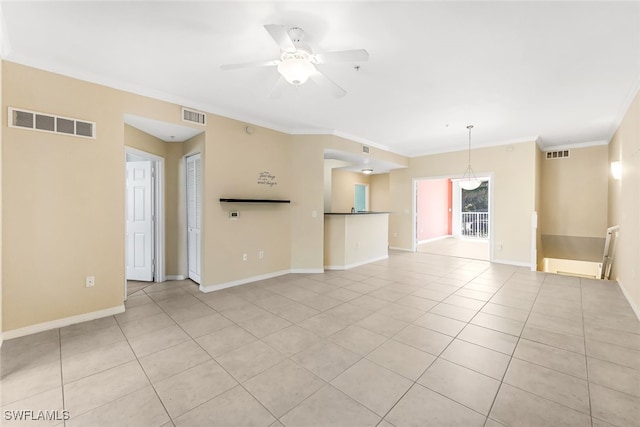 unfurnished living room with ceiling fan, light tile patterned floors, and crown molding