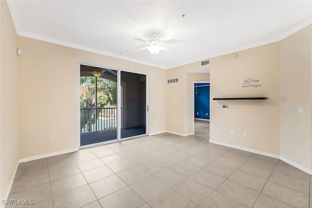 tiled spare room featuring ceiling fan and ornamental molding