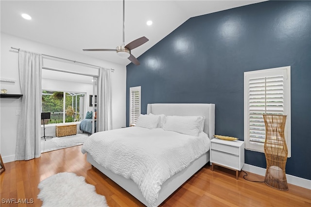 bedroom with lofted ceiling, ceiling fan, and hardwood / wood-style floors