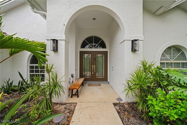 entrance to property featuring french doors