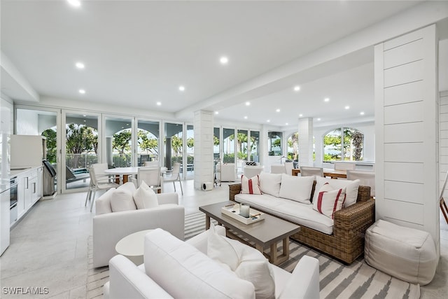 living room with decorative columns