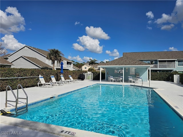 view of pool featuring a patio