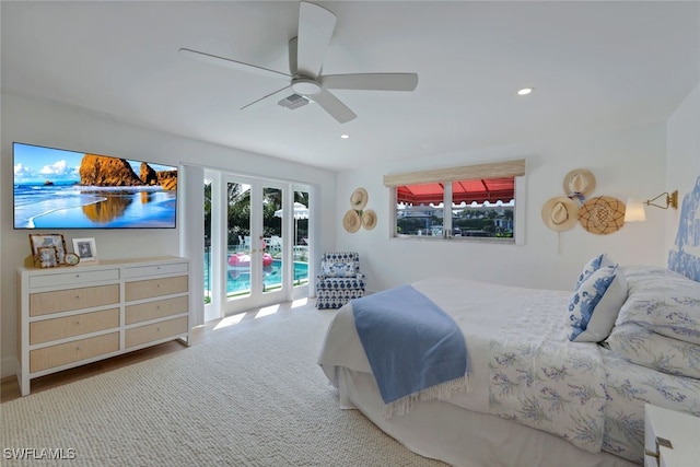 bedroom featuring ceiling fan, access to exterior, and french doors