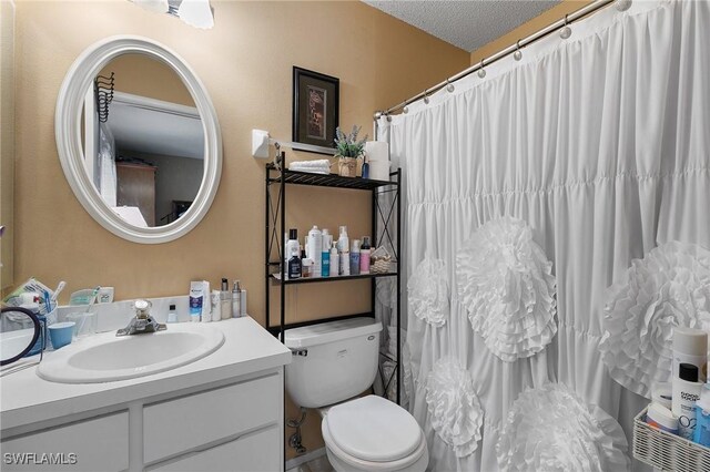120 Sand Hill St, Marco Island, FL 34145 - full bath with vanity, curtained shower, and a textured ceiling