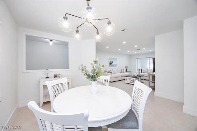 dining area with light tile patterned floors