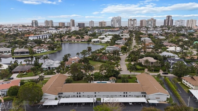 drone / aerial view with a water view