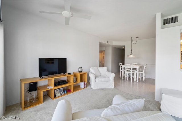 living room featuring ceiling fan