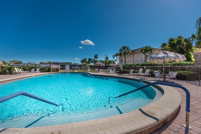 view of swimming pool featuring a patio area