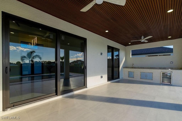 view of patio with ceiling fan