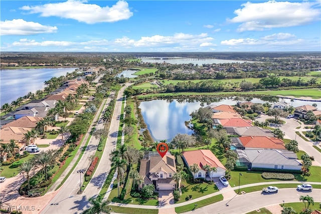 drone / aerial view featuring a water view