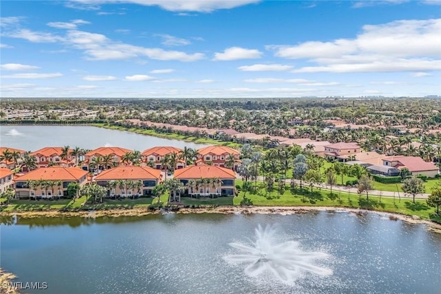 aerial view with a residential view and a water view