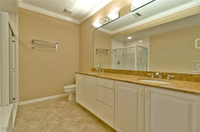 bathroom with tile patterned floors, toilet, a shower with door, ornamental molding, and vanity