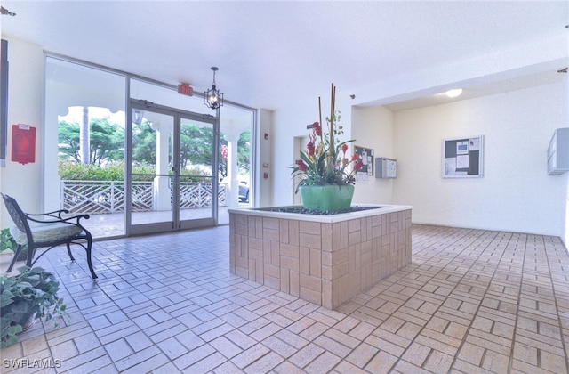 kitchen featuring an inviting chandelier