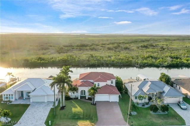 bird's eye view with a water view