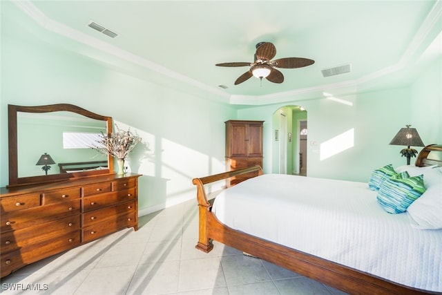 tiled bedroom featuring ornamental molding and ceiling fan