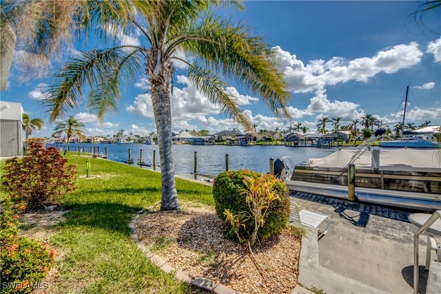 property view of water featuring a boat dock