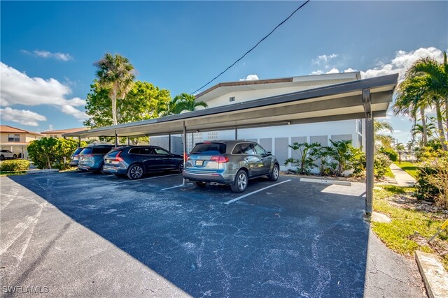 view of parking featuring a carport