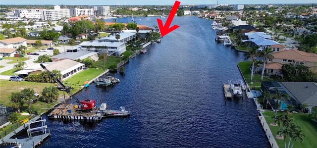 drone / aerial view featuring a water view