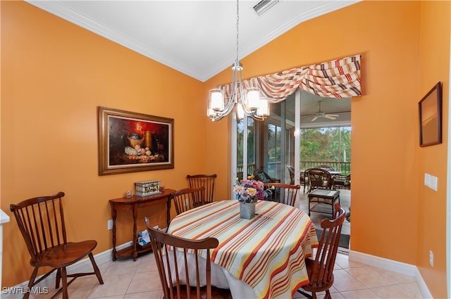 tiled dining space with ceiling fan with notable chandelier, lofted ceiling, and ornamental molding