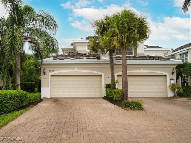 view of front of property with a garage