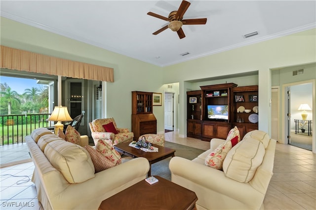 living room with light tile patterned flooring, ceiling fan, and crown molding