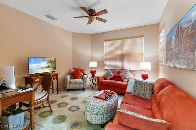 living room featuring ceiling fan