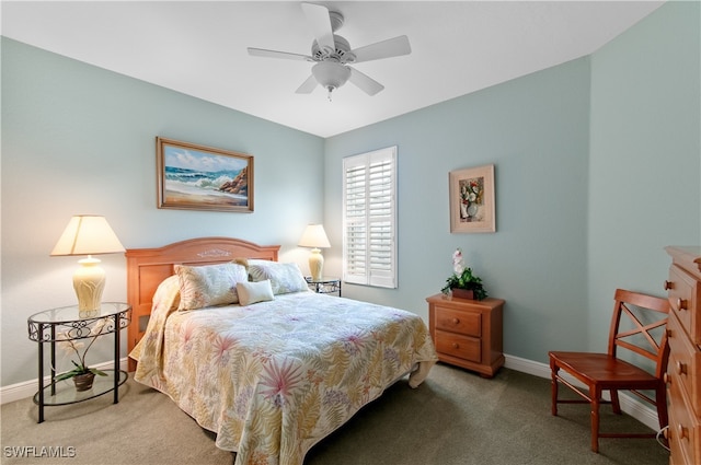 bedroom with ceiling fan and carpet flooring